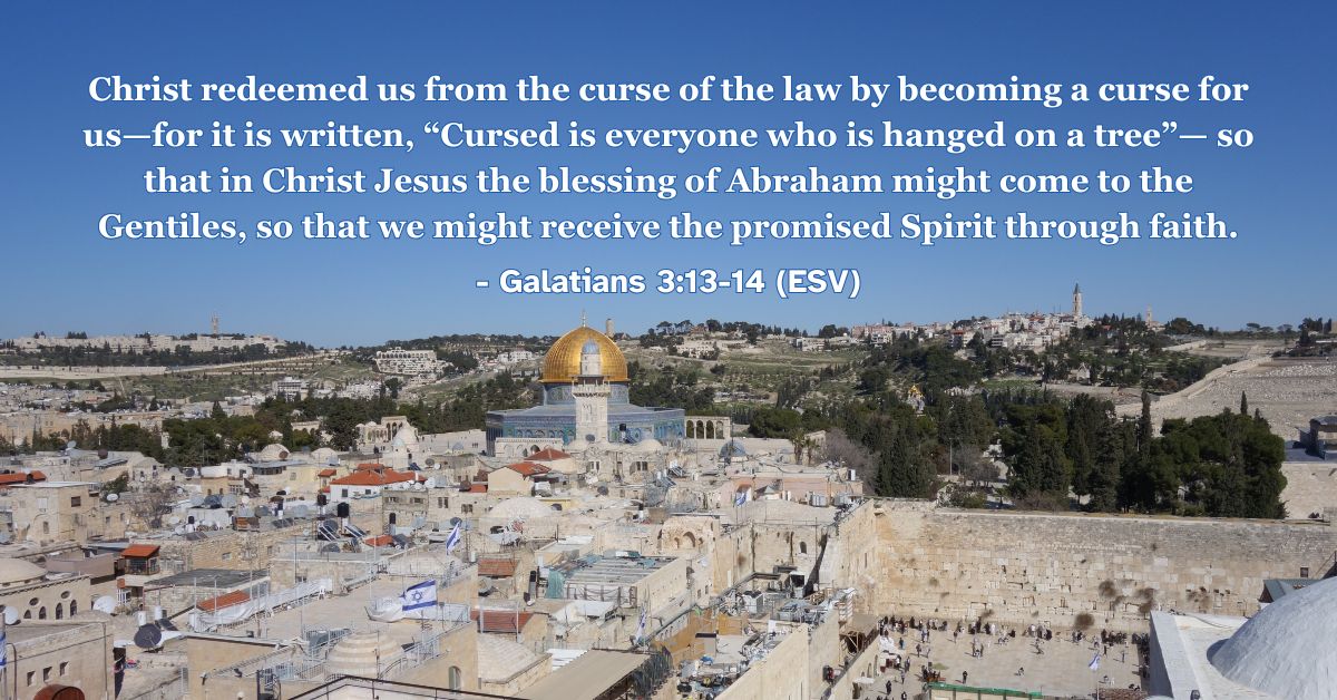 Bible verse from Galatians 3:13-14 about Christ redeeming us from the curse of the law.